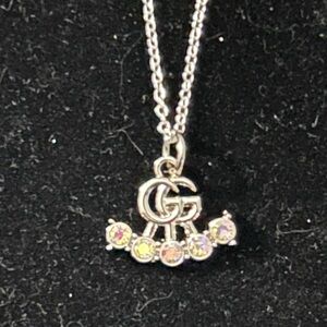 Upcycled Gucci zipper pull on 925 Silver chain.